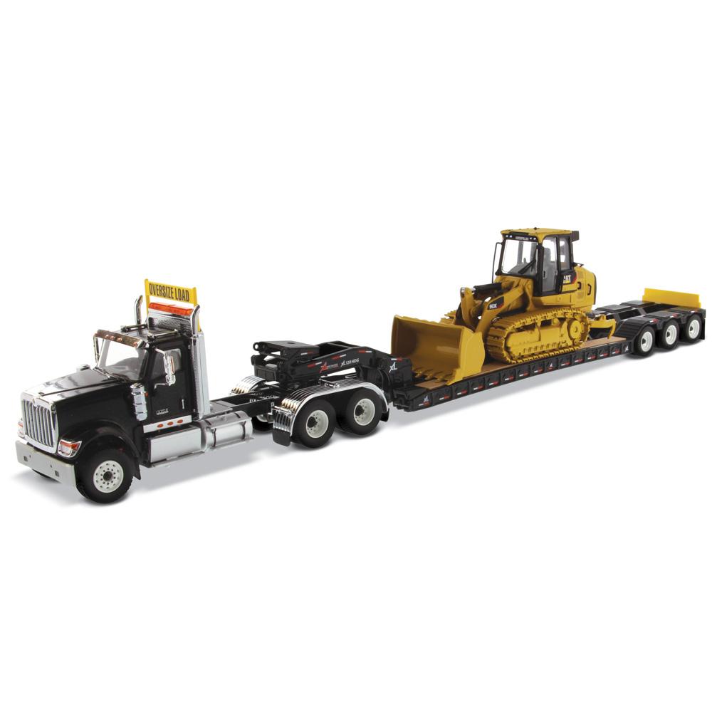 1:50 International HX520 Tandem Tractor + XL 120 Trailer, Black w/ Cat® 963K Track loader loaded including both rear boosters, Transport Series, 85599 RETIRING SOON