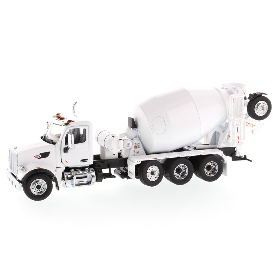 1:50 Peterbilt 567 SFFA Tandem with Pusher & Tag Axles with McNeilus Bridgemaster Mixer, White, Transport Series, 71074